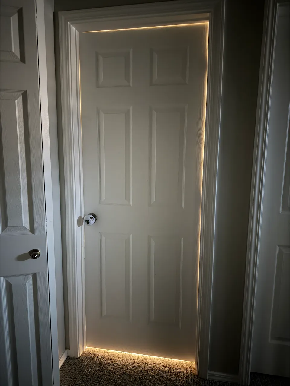 Visible light gaps along the side and bottom of a closed interior door